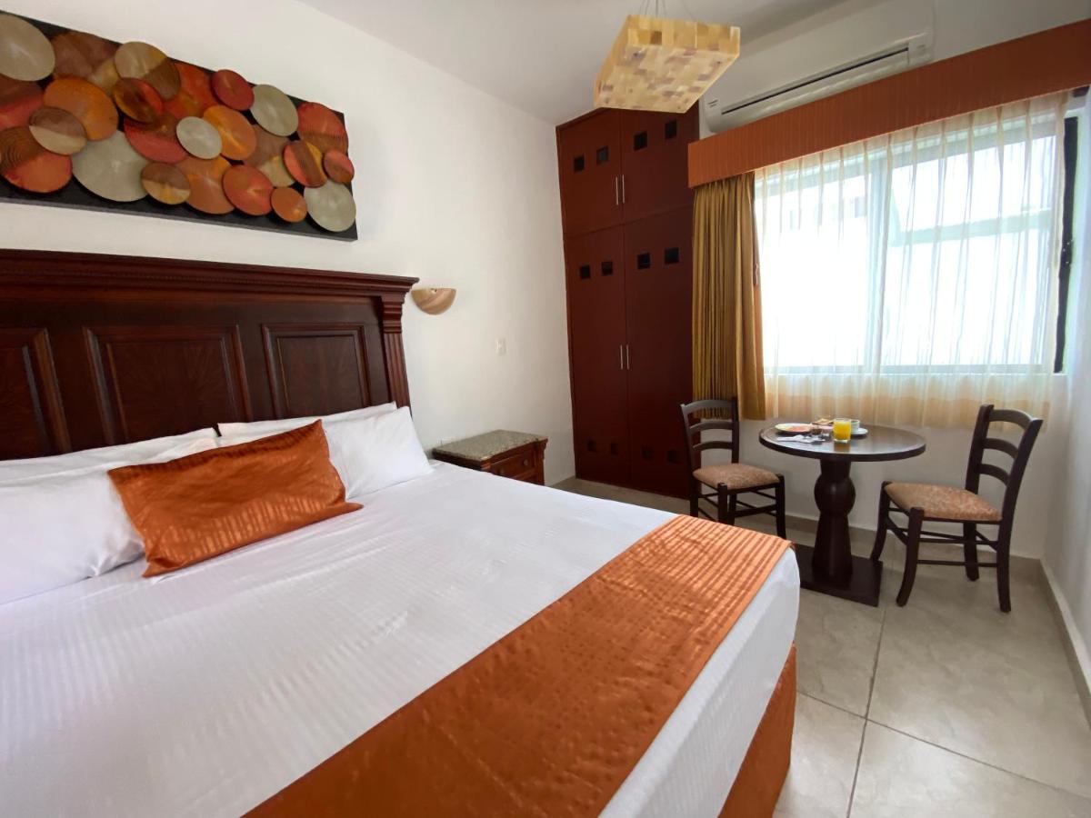 Hotel Las Golondrinas Плая-дель-Кармен Экстерьер фото